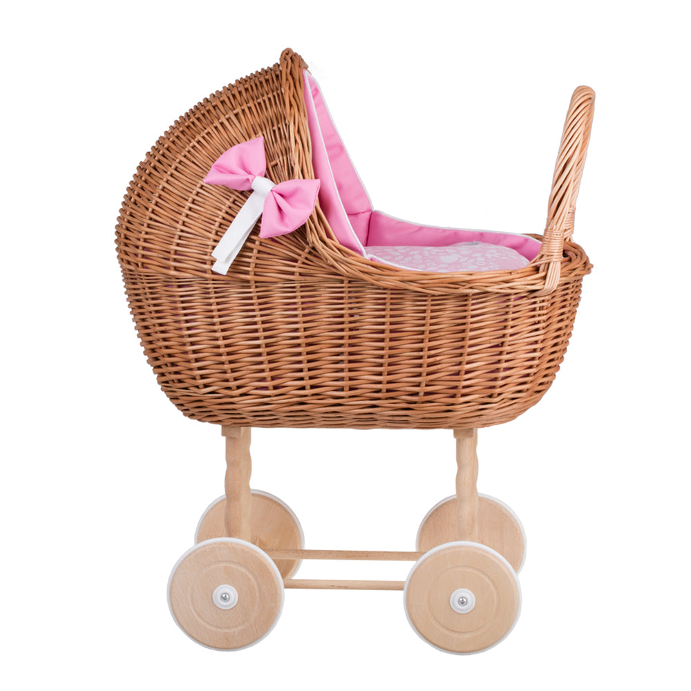 Lili wicker doll stroller with pink trim, blanket, and pillow
