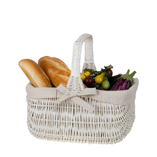 Willesia wicker basket with beige lining and handle TheWickerStories