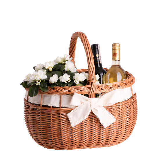 Winalia wicker shopping basket with cream trim, handle, and bow TheWickerStories