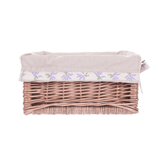 Nova wicker storage basket for shelf with beige trim, handles, and bows TheWickerStories