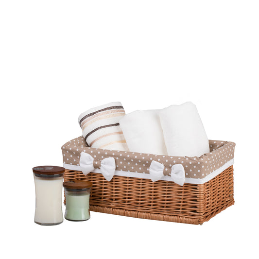 wicker storage basket with beige trim and bows
