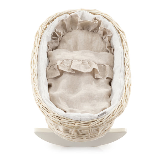 Mimi wicker doll cradle with white trim, including pillow and blanket, on runners TheWickerStories