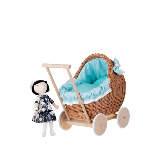 wicker doll stroller with mint trim, blanket, and pillow