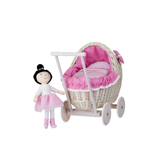 wicker doll stroller with pink trim, blanket, and pillow
