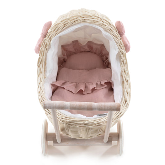 Desayer wicker doll stroller with linen trim and pink bedding, including a quilt, pillow, and handle TheWickerStories