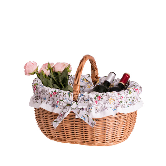 Werburga shopping basket with a wicker handle and white trim TheWickerStories
