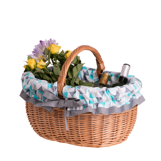 Werburga shopping basket with a wicker handle and blue trim TheWickerStories