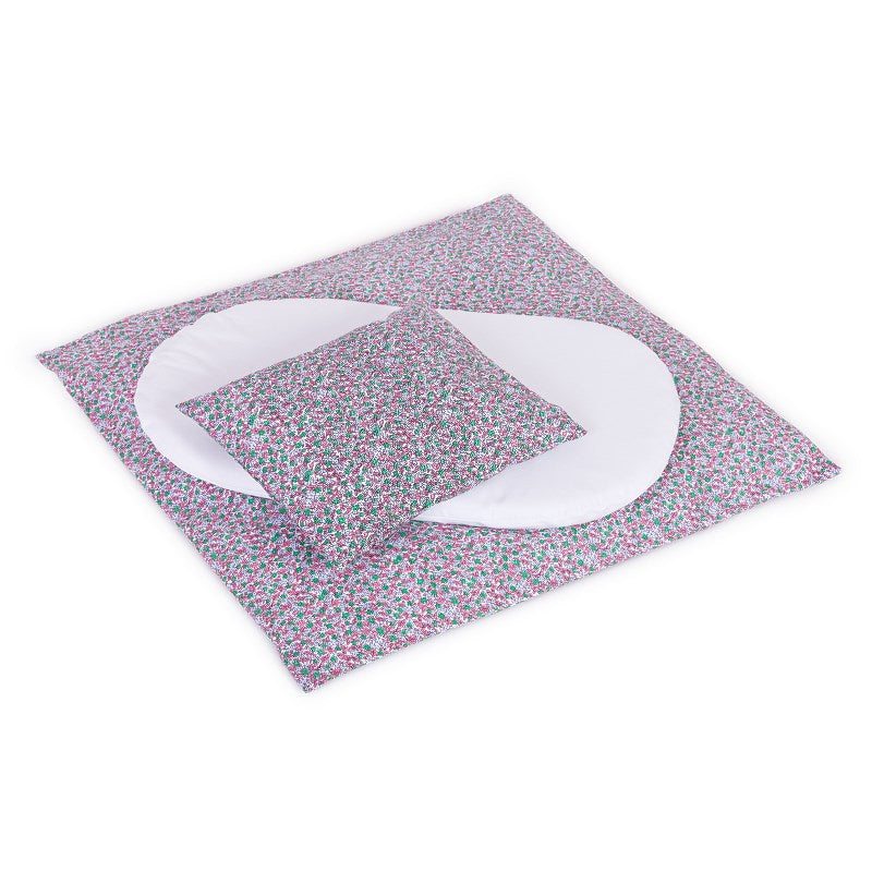 Papilio wicker baby stroller with white trim, blanket, and pillow, on wheels with a lower basket TheWickerStories