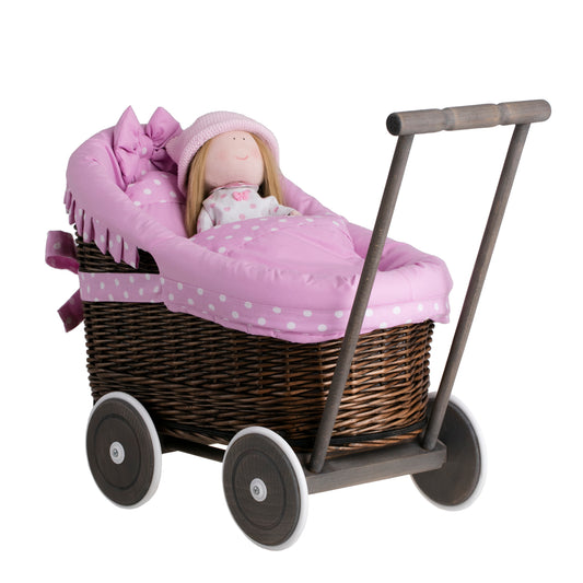 Luna wicker doll stroller with pink trim, blanket, and pillow