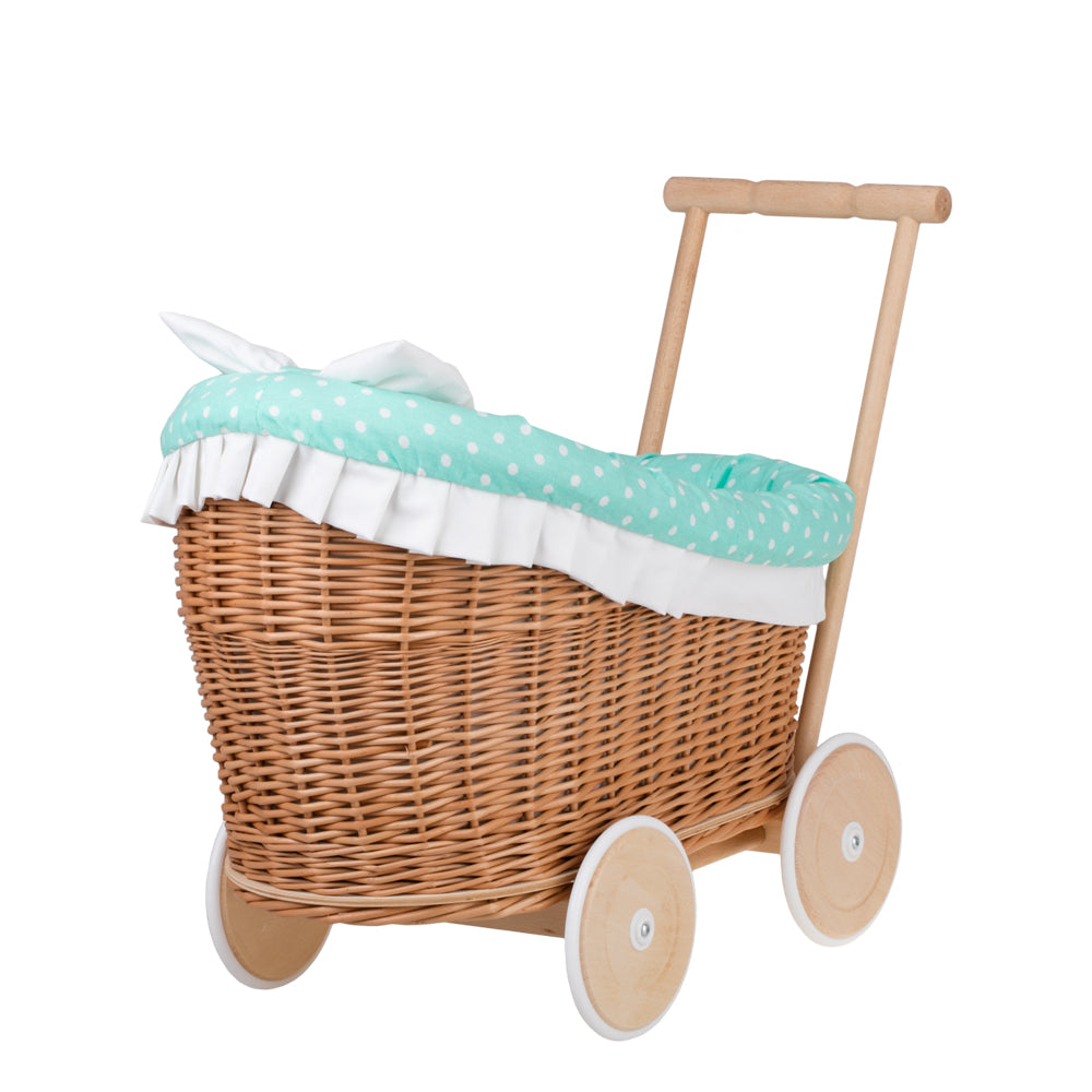 Luna wicker doll stroller with green trim, blanket, and pillow