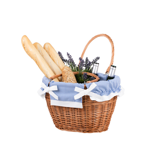 wicker shopping basket with blue trim and handles