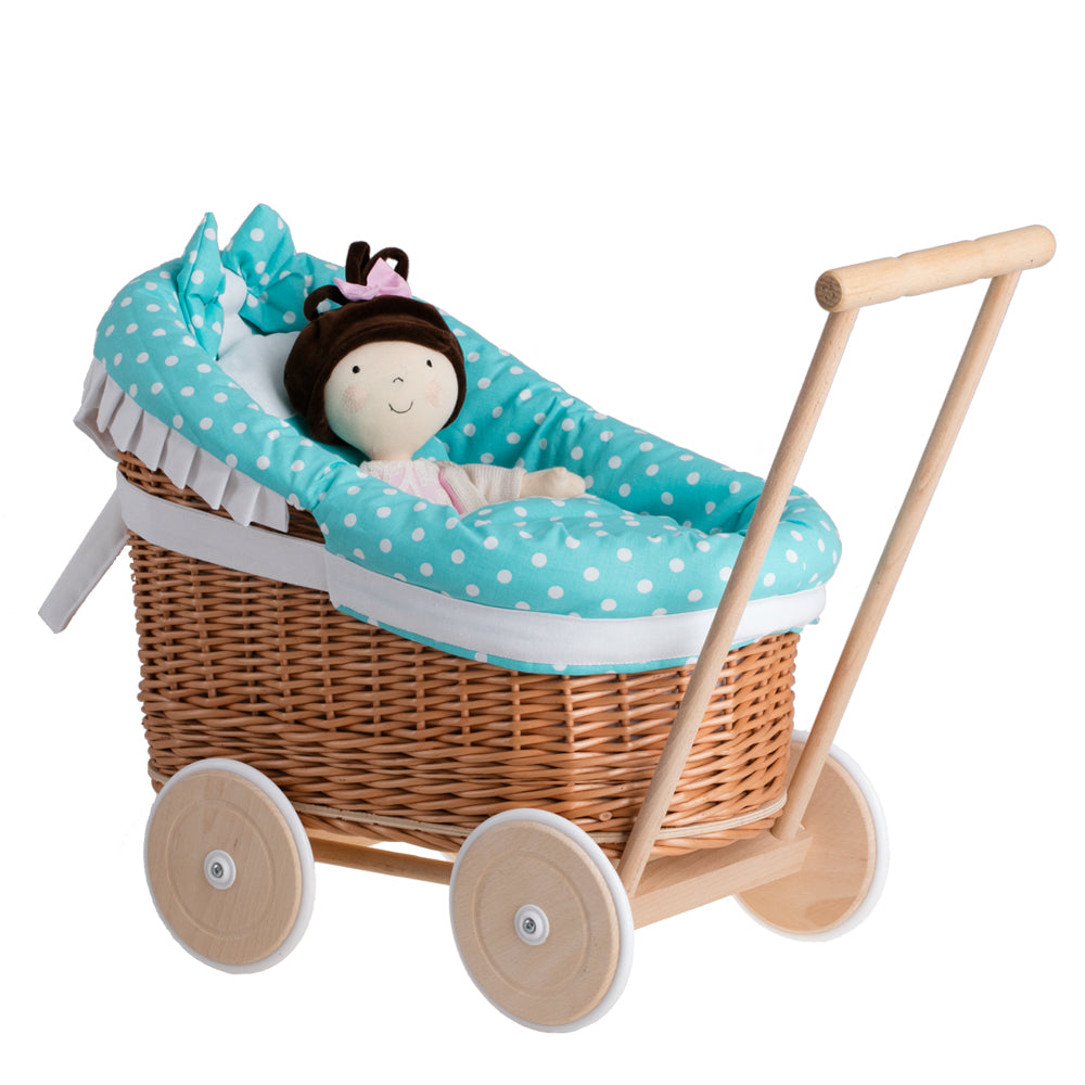 Luna wicker doll stroller with green trim, blanket, and pillow