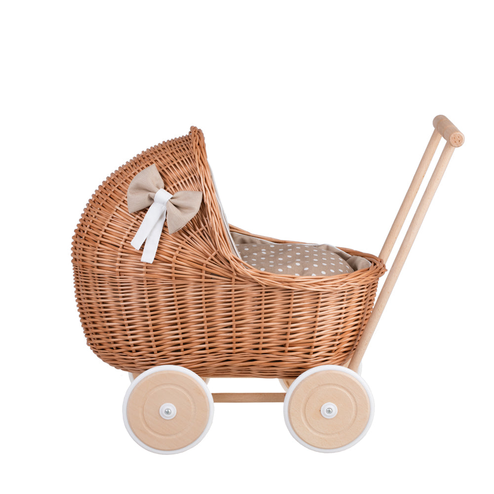Lili wicker doll stroller with beige trim, blanket, and pillow