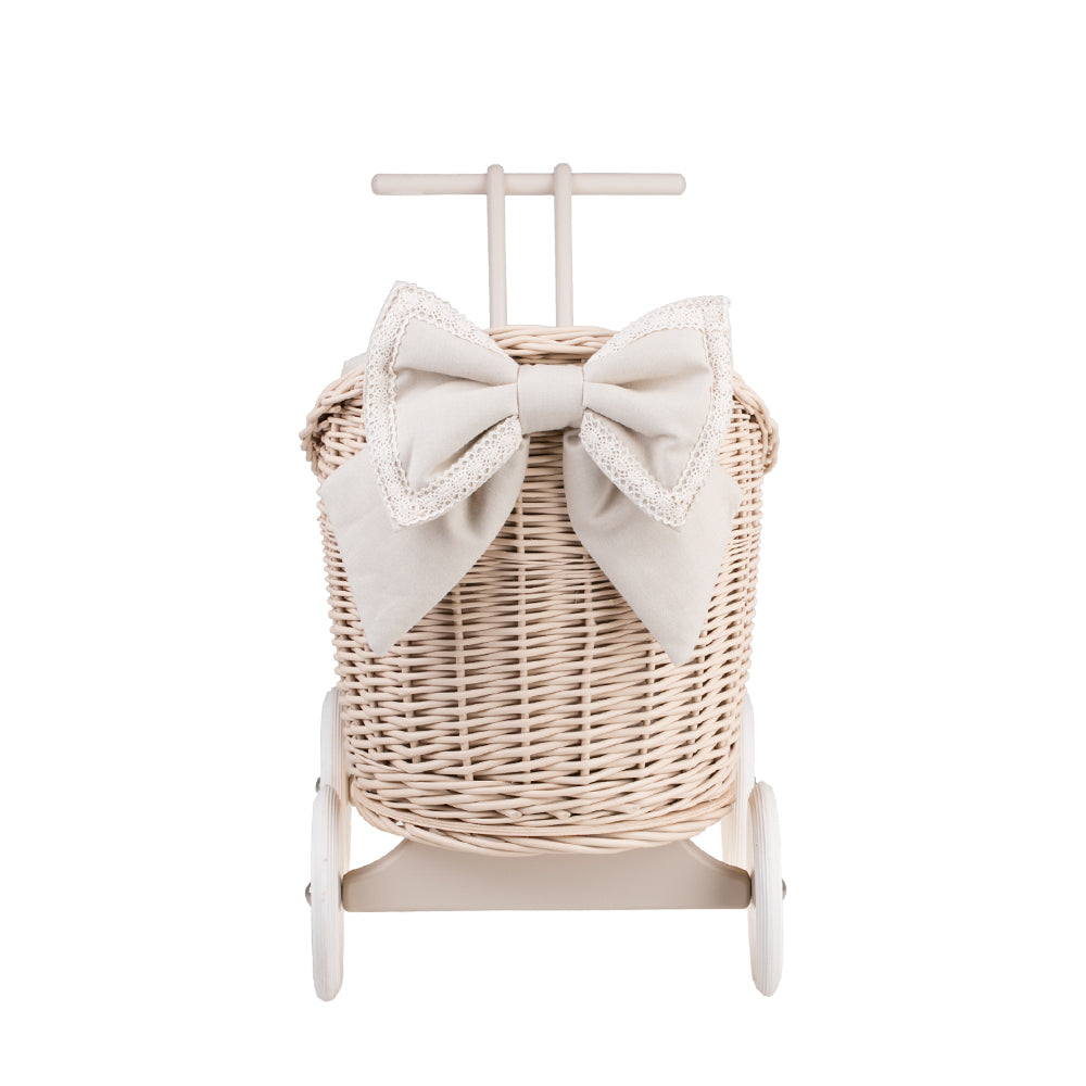 Luna wicker doll stroller with beige trim, blanket, and pillow