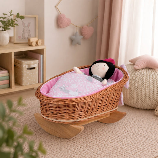 wicker cradle for dolls with pink lining, pillow and duvet