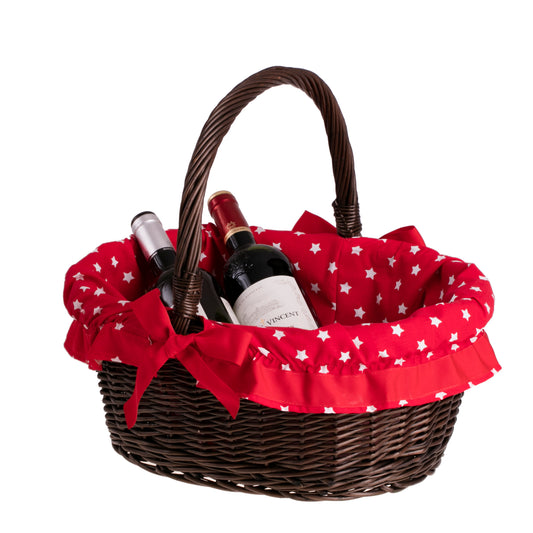 koš od pruća za poklone s crvenim obrubom i ručkom