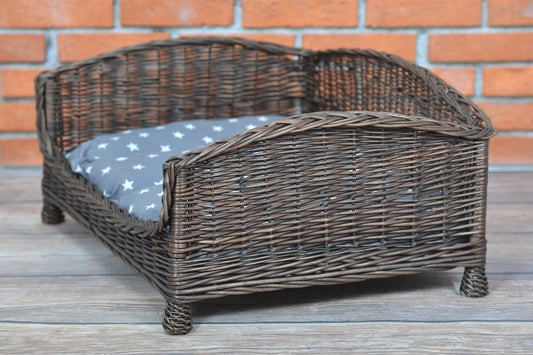 Erivia wicker pet bed for dogs and cats with gray cushion and low entry TheWickerStories