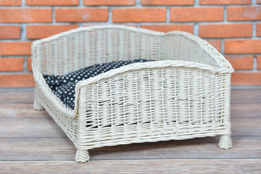 Erivia wicker pet basket for dogs and cats with cushion and low entrance TheWickerStories
