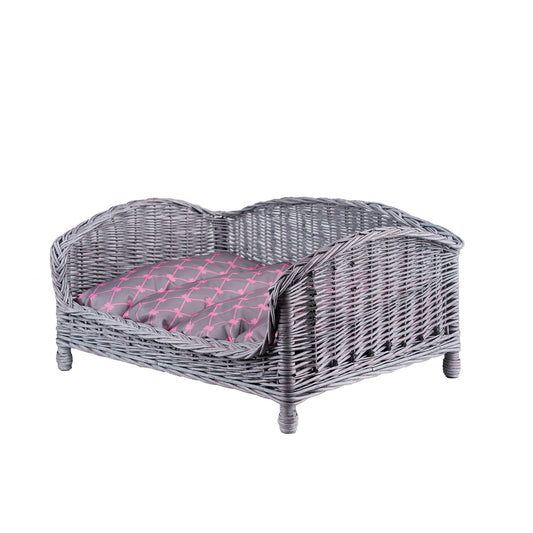 Erivia wicker basket bed for dogs and cats with cushion TheWickerStories