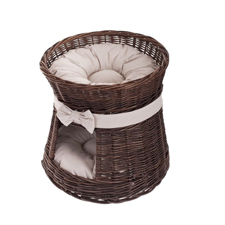 Eralis two-tier wicker cat house with cushions and a bow TheWickerStories