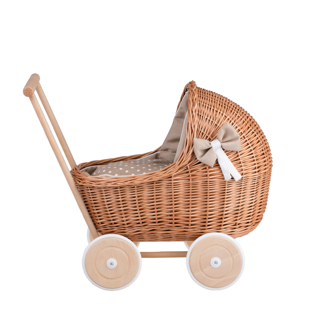 Lili wicker doll stroller with beige trim, blanket, and pillow