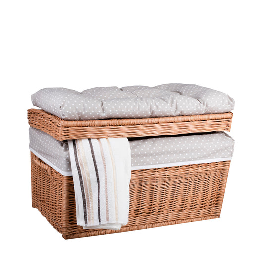 wicker basket with beige trim, cushion, handles and lid