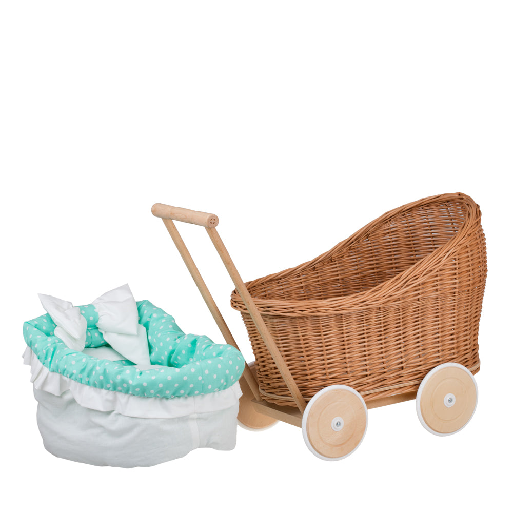 Luna wicker doll stroller with green trim, blanket, and pillow