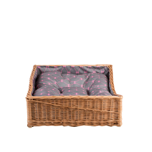 Eris wicker pet bed for dogs and cats with gray cushion and low entrance TheWickerStories