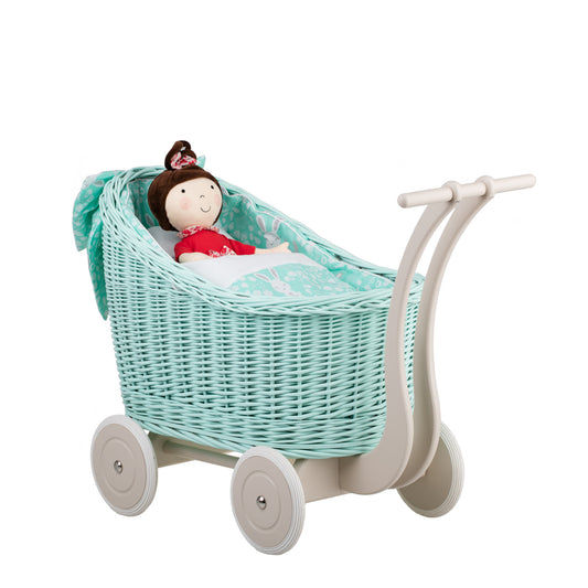 wicker doll stroller with mint trim, blanket and pillow