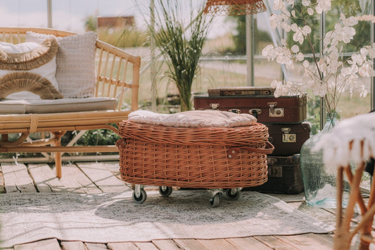 Cornus wicker toy chest with beige trim, seat and lid on wheels TheWickerStories