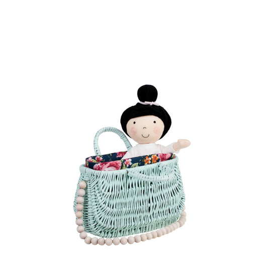Werlissa wicker beach bag with navy trim, featuring handles and a strap made of wooden beads TheWickerStories