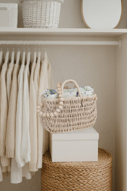 wicker handbag with white lining and handle