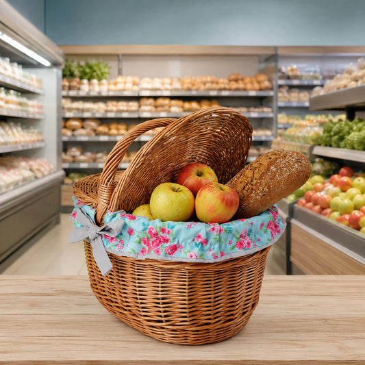 wicker picnic basket with blue trim, with lid and handle