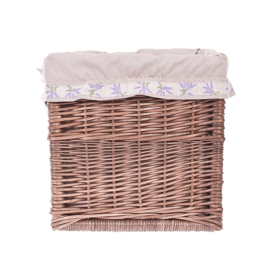 rieten opbergmand voor op een rek met beige bies, handvatten en strikjes