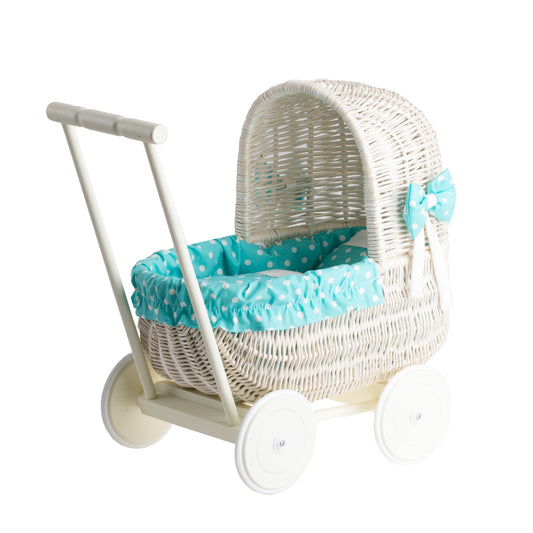 Lala wicker doll stroller with green trim, blanket, and pillow