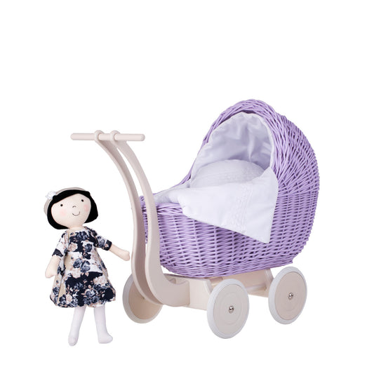 Lili wicker doll stroller with white trim, blanket, and pillow