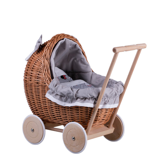 Lili wicker doll stroller with gray trim, blanket, and pillow