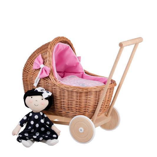 Lili wicker doll stroller with pink trim, blanket, and pillow