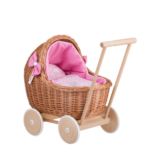 Lili wicker doll stroller with pink trim, blanket, and pillow