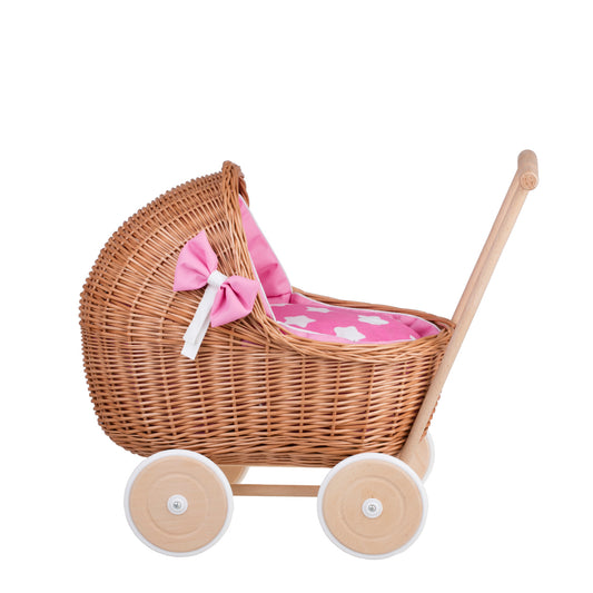 Lili wicker doll stroller with pink trim, blanket, and pillow