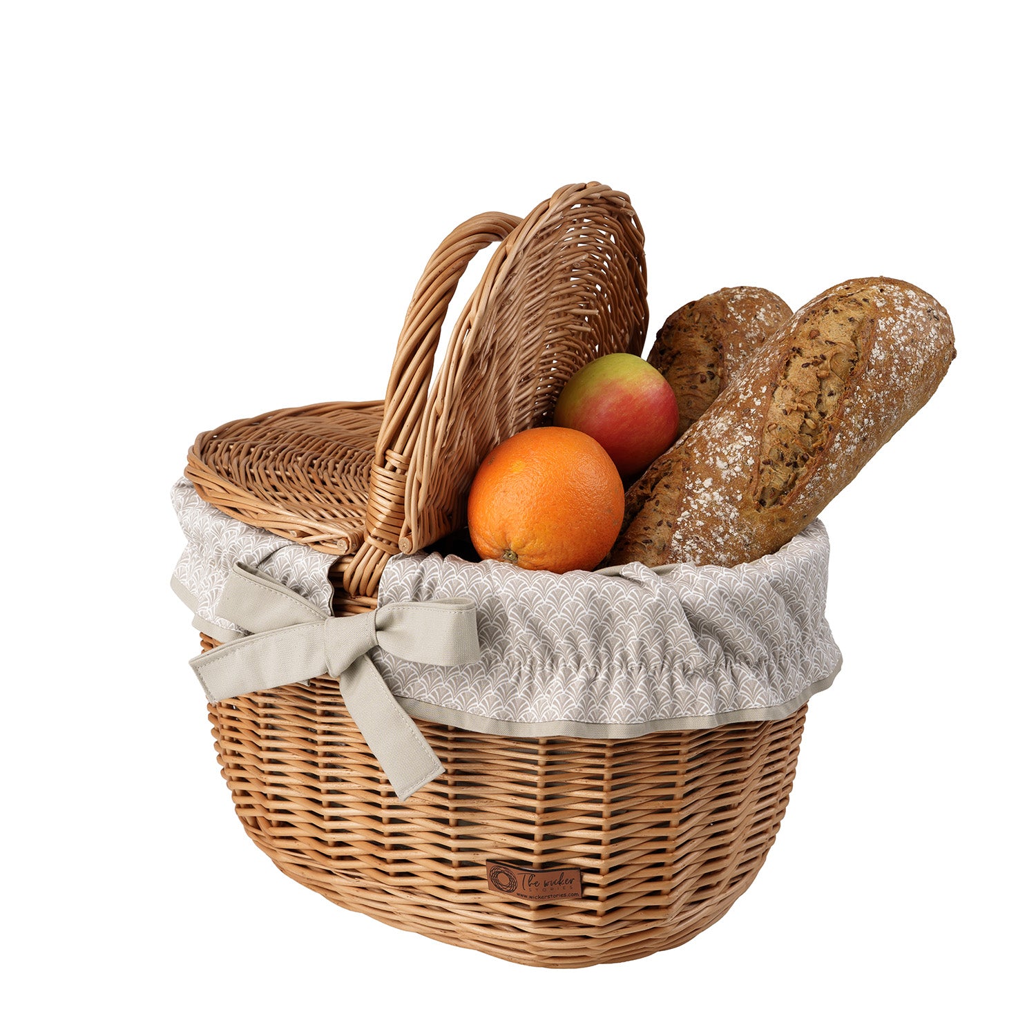 wicker picnic basket with beige trim, with lid and handle