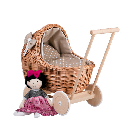 Lili wicker doll stroller with beige trim, blanket, and pillow