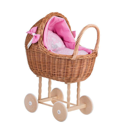 Lili wicker doll stroller with pink trim, blanket, and pillow