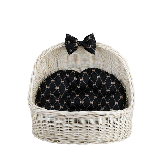 Elsa wicker pet bed basket with black cushion and bow