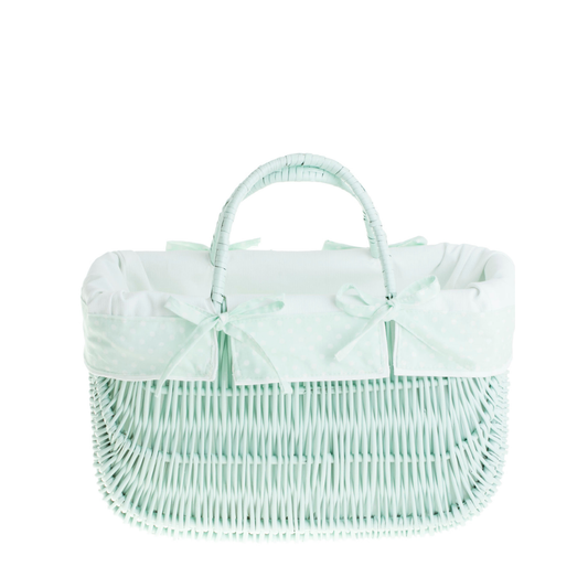 Flätad shoppingkorg i pil med mintgrön kant och två handtag
