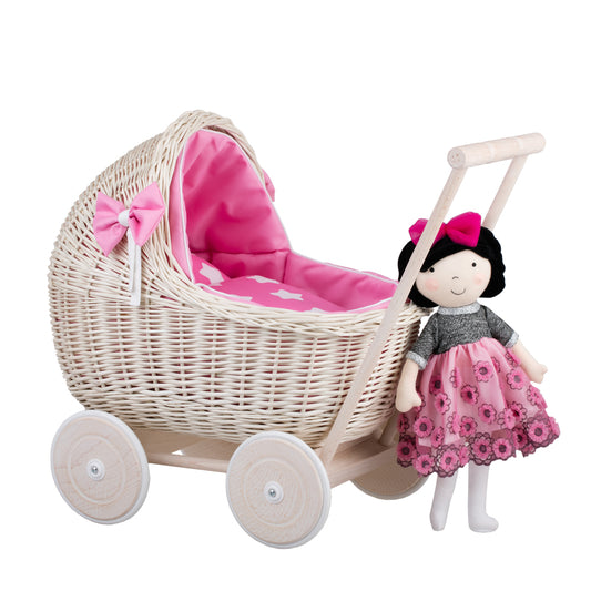 Lili wicker doll stroller with pink trim, blanket, and pillow