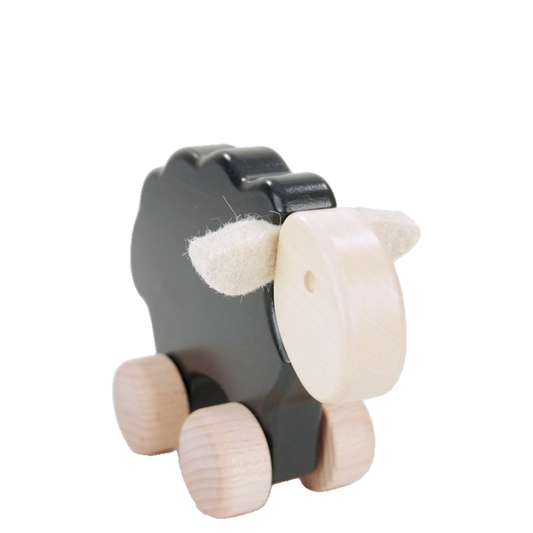 wooden sheep on wheels – children's toy