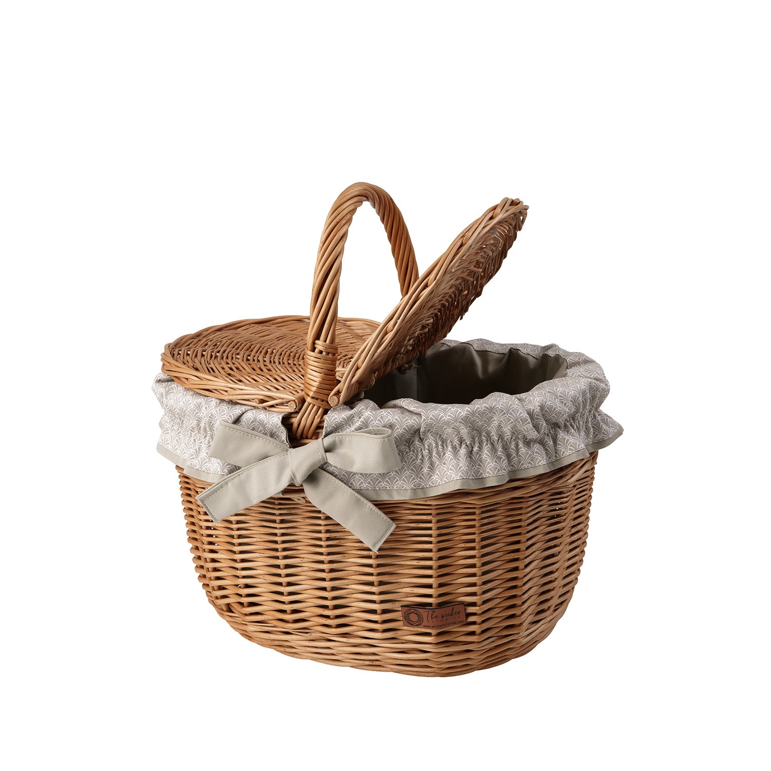 wicker picnic basket with beige trim, with lid and handle