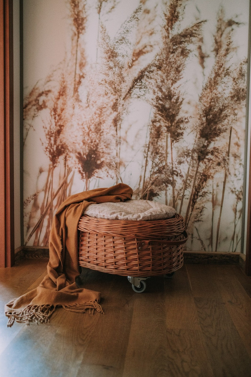 Cornus wicker toy chest with beige trim, seat and lid on wheels TheWickerStories