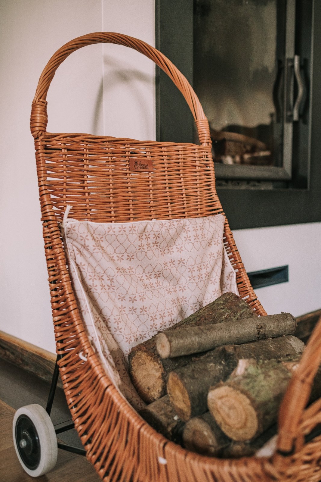 Quercus wicker firewood basket with cream trim, on casters TheWickerStories